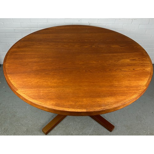 496 - A HELTBORG MOBLER TEAK CIRCULAR EXTENDING DINING TABLE WITH TWO EXTRA LEAVES