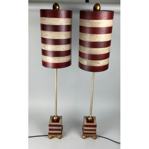 521 - A PAIR OF RED AND WHITE STRIPED LAMPS, 98cm h (each) (2)