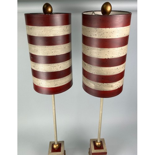 521 - A PAIR OF RED AND WHITE STRIPED LAMPS, 98cm h (each) (2)