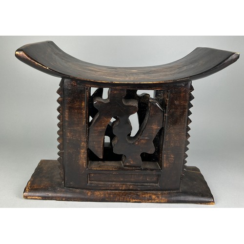 474 - AN ANTIQUE ASHANTI STOOL, 55cm w x 26.5cm d x 43cm h

Used condition, with marks, dents and scratche... 