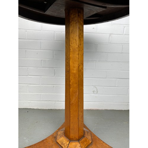 450 - A 19TH CENTURY CONTINENTAL BIEDERMEIER OCCASCIONAL TABLE, 

The circular top raised upon an octagona... 