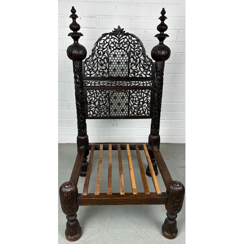 470 - A 19TH CENTURY INDIAN PIDDHA CHAIR, 

Heavily carved hardwood possibly Bombay wood, very low wooden ... 