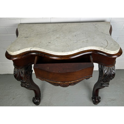 459 - A GEORGIAN DESIGN CONSOLE TABLE WITH WHITE MARBLE TOP, 

Two legs heavily carved with acanthus leave... 