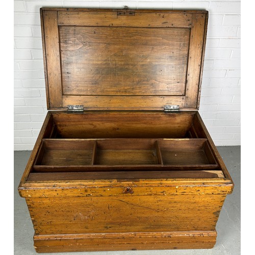 472 - A LARGE 19TH CENTURY PINE CARPENTERS BOX,

102cm x 63cm x 60cm 

The rising lid opening to reveal a ... 