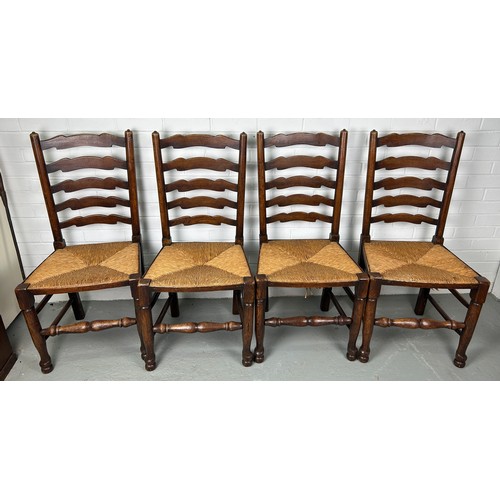 469 - A SET OF FOUR 19TH CENTURY COUNTRY HOUSE LADDERBACK CHAIRS WITH RUSH SEATS (4) 

Each 100cm x 48cm x... 