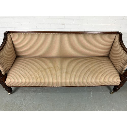 466 - A LARGE 19TH CENTURY GEORGE III DESIGN SETTEE UPHOLSTERED IN PINK AND CREAM TICKING FABRIC, 

Raised... 