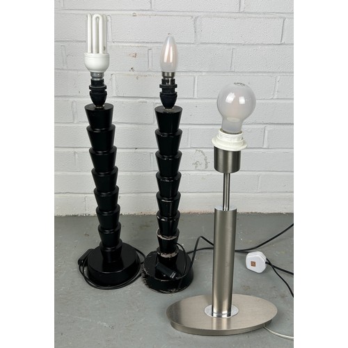 523 - A PAIR OF BLACK WOODEN LAMPS AND ANOTHER CHROME (3)