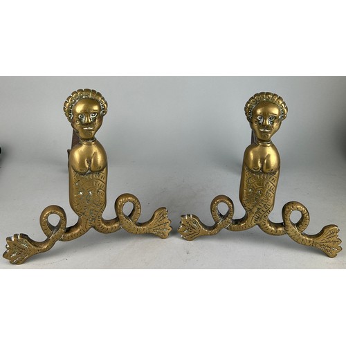 446 - A PAIR OF 19TH CENTURY BRASS FIREDOGS DEPICTING A MALE FIGURE OF A SEA GOD