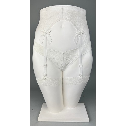 440 - KEN CLARKE (B.1948) A LIFE MODEL PLASTER CAST SCULPTURE OF A FEMALE TORSO WEARING SUSPENDERS AND STO... 