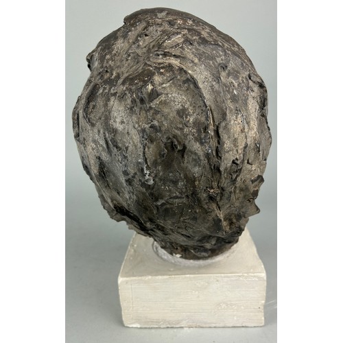 441 - A BRONZE SCULPTURAL BUST OF A GENTLEMAN'S HEAD, 

Mounted on plaster stand.