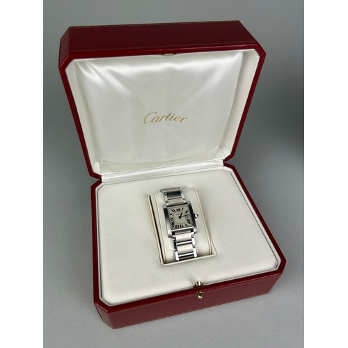 15 - A GENTLEMAN'S CARTIER STAINLESS STEEL TANK FRANCAISE, 

Purchased in the 1990's, with original box. ... 