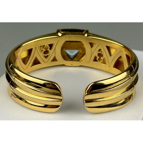 12 - A CORUM 18CT GOLD BRACELET WITH AQUAMARINES AND DIAMONDS,

Weight: 92.8gms

6.8cm x 5.3cm x 2.3cm