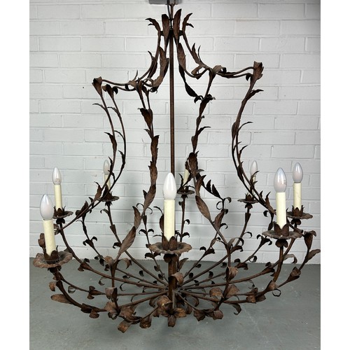 505 - A LARGE TEN ARM WROUGHT IRON CHANDELIER OF LEAF DESIGN,

110cm x 110cm