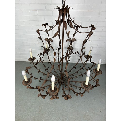 505 - A LARGE TEN ARM WROUGHT IRON CHANDELIER OF LEAF DESIGN,

110cm x 110cm