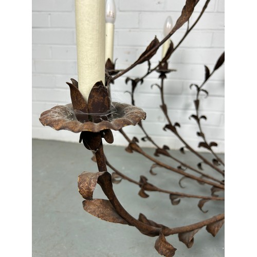 505 - A LARGE TEN ARM WROUGHT IRON CHANDELIER OF LEAF DESIGN,

110cm x 110cm