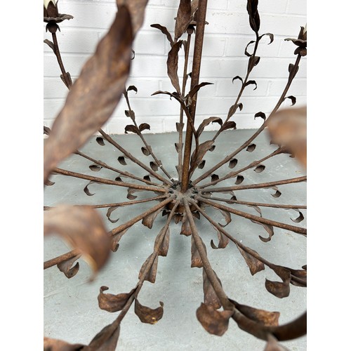 505 - A LARGE TEN ARM WROUGHT IRON CHANDELIER OF LEAF DESIGN,

110cm x 110cm