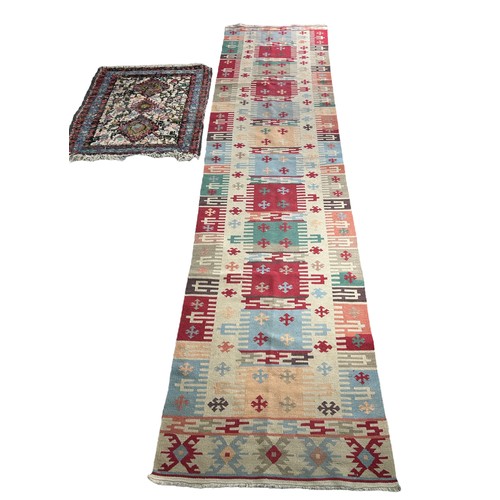 558 - A LONG KILIM RUNNER AND ANOTHER SMALL RUG (2) 

Runner 310cm x 75cm.