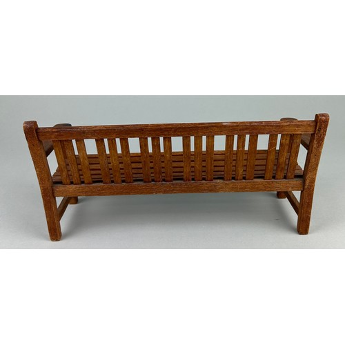 485 - AN APPRENTICE MODEL OF A GARDEN BENCH, 20TH CENTURY