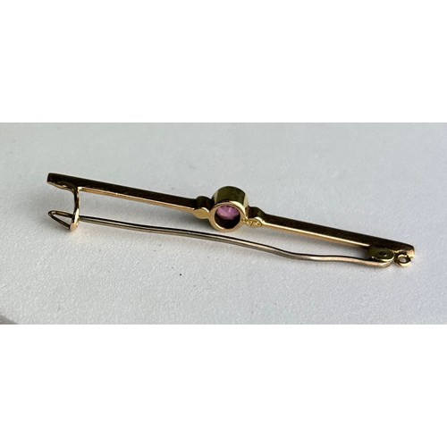 49 - A 15CT GOLD BAR BROOCH WITH PINK GEMSTONE,

Weight: 2.7gms