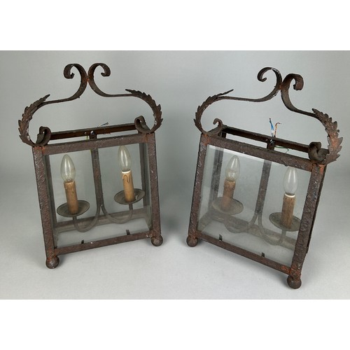 536 - A PAIR OF ORNATE ANTIQUE CAST METAL WALL LANTERNS, 48cm h x 33cm w (each)

Used condition, due to ag... 