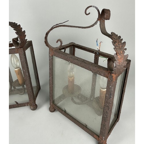 536 - A PAIR OF ORNATE ANTIQUE CAST METAL WALL LANTERNS, 48cm h x 33cm w (each)

Used condition, due to ag... 