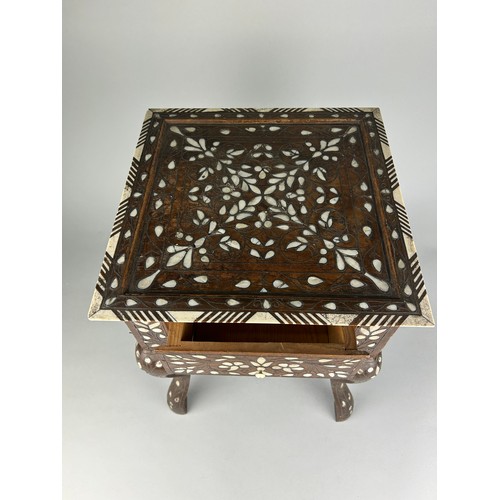 464A - A SYRIAN MOTHER OF PEARL INLAID TABLE, 35cm w x 35cm d x 45cm h

Used condition, with marks, dents a... 