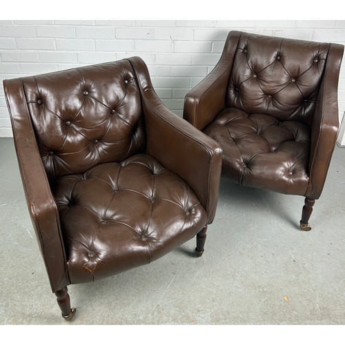 482 - A PAIR OF BROWN LEATHER BUTTON BACK CLUB CHAIRS, 

Removed from Brown's Club London. Each raised on ... 