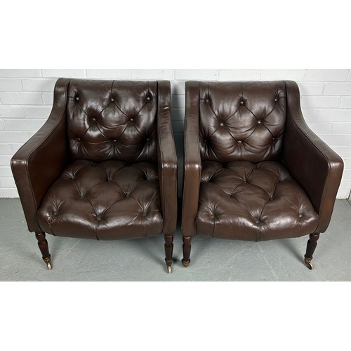 482 - A PAIR OF BROWN LEATHER BUTTON BACK CLUB CHAIRS, 

Removed from Brown's Club London. Each raised on ... 