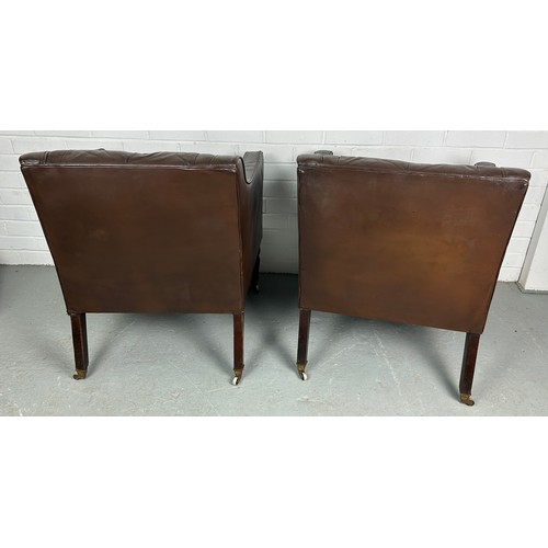 482 - A PAIR OF BROWN LEATHER BUTTON BACK CLUB CHAIRS, 

Removed from Brown's Club London. Each raised on ... 