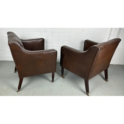 482 - A PAIR OF BROWN LEATHER BUTTON BACK CLUB CHAIRS, 

Removed from Brown's Club London. Each raised on ... 