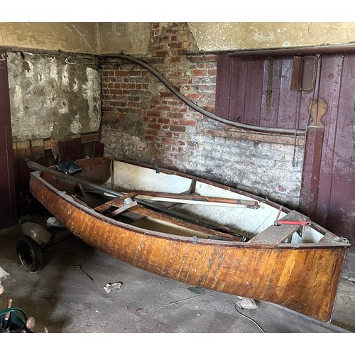 491 - A LARGE ROWING BOAT BUILT BY HAND BY THE VENDORS FATHER, 
 
Along with two oars, various related equ... 