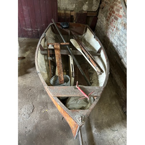 491 - A LARGE ROWING BOAT BUILT BY HAND BY THE VENDORS FATHER, 
 
Along with two oars, various related equ... 