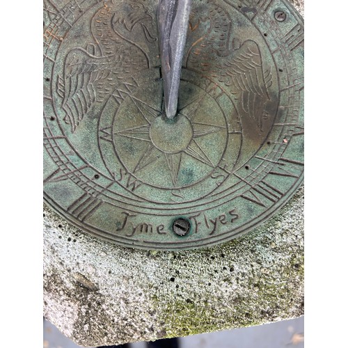 490A - A LARGE STONE SUNDIAL, 

Dated 1793 'Time Flyes', but later.

Diameter of top: 25cm 
Diameter of bas... 