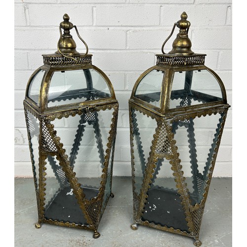 529 - A PAIR OF ANTIQUE METAL AND GLASS GARDEN LANTERNS, 65cm h (each) (2)


Used condition, with marks co... 