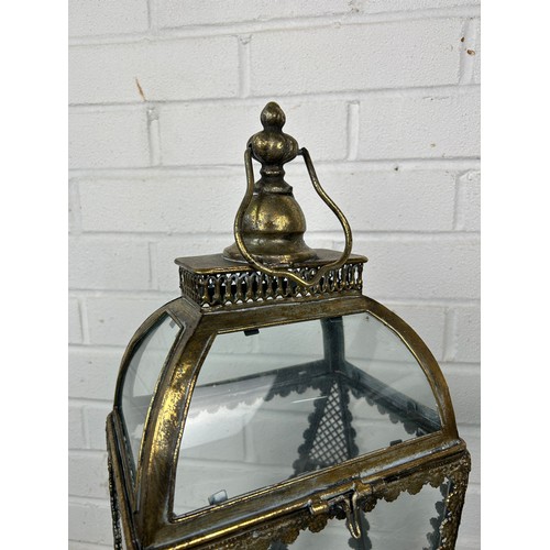 529 - A PAIR OF ANTIQUE METAL AND GLASS GARDEN LANTERNS, 65cm h (each) (2)


Used condition, with marks co... 