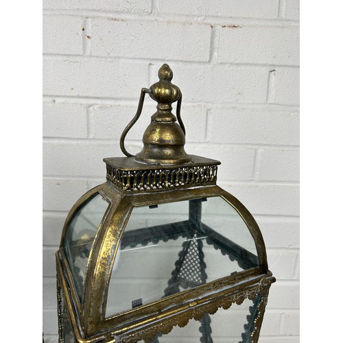 529 - A PAIR OF ANTIQUE METAL AND GLASS GARDEN LANTERNS, 65cm h (each) (2)


Used condition, with marks co... 