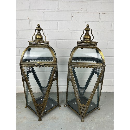 529 - A PAIR OF ANTIQUE METAL AND GLASS GARDEN LANTERNS, 65cm h (each) (2)


Used condition, with marks co... 