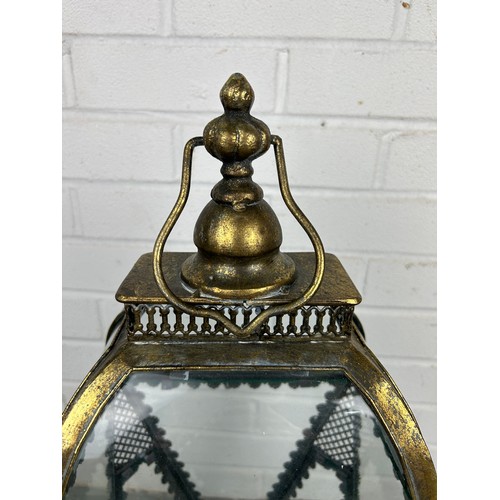 530 - A SINGLE ANTIQUE METAL AND GLASS GARDEN LANTERN, 65cm h 


Used condition with marks consistent with... 