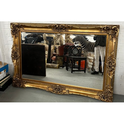 508 - A VERY LARGE MODERN GILTWOOD MIRROR