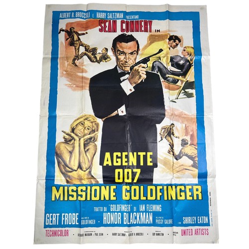 431 - A JAMES BOND GOLDFINGER 'AGENTE 007' FILM POSTER 

135cm x 100cm 

Folded but overall good condition... 