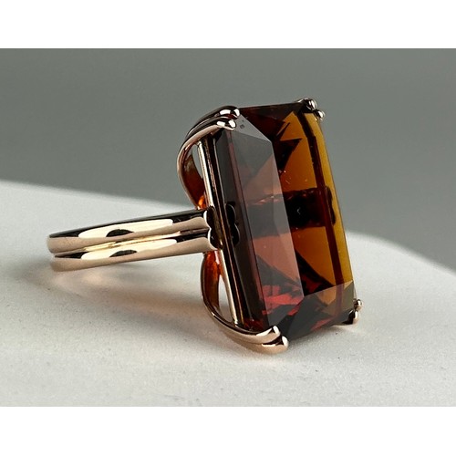 2 - A VERY LARGE 49.75CT WEIGHT BRAZILIAN MADEIRA CITRINE SET IN 9CT ROSE GOLD RING, 

An octagonal step... 