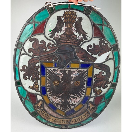 563 - WIMBLEDON INTEREST: A STAINED GLASS PANEL WITH COAT OF ARMS, 

From a church in Wimbledon. Some dama... 