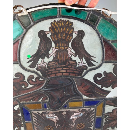 563 - WIMBLEDON INTEREST: A STAINED GLASS PANEL WITH COAT OF ARMS, 

From a church in Wimbledon. Some dama... 