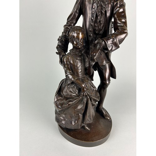 445 - A LARGE BRONZE BUST OF MOZART TEACHING A GIRL,

50cm x 20cm