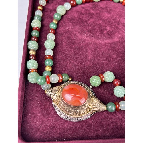 62 - A SILVER, SILVER GILT AND GEMSTONE NECKLACE BY EILEEN COYNE, 

With original case.