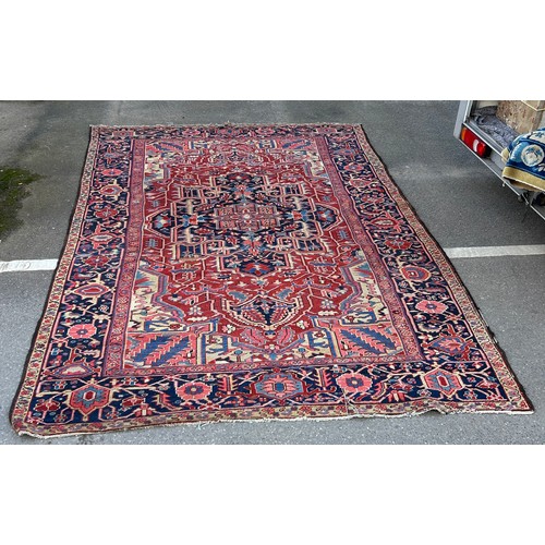 455A - A LARGE ANTIQUE TURKISH RUG, 

345CM X 235CM