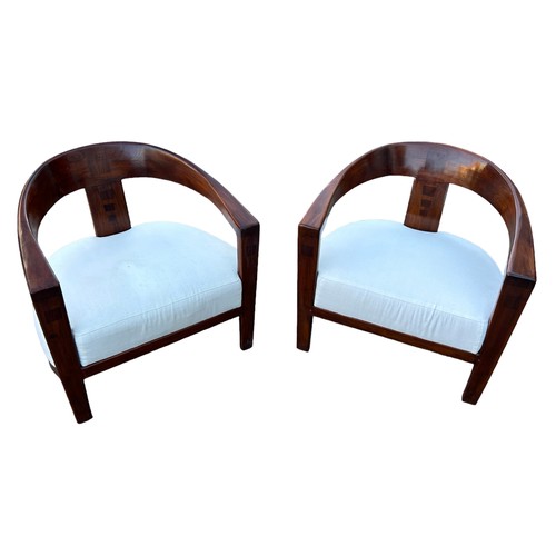 483 - IN THE MANNER OF DAVID LINLEY: TWO DEEP SEATED MID CENTURY ARMCHAIRS WITH WHITE UPHOLSTERED SEATS (2... 