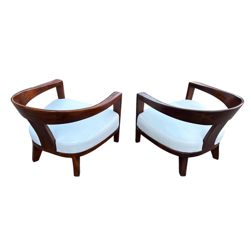 483 - IN THE MANNER OF DAVID LINLEY: TWO DEEP SEATED MID CENTURY ARMCHAIRS WITH WHITE UPHOLSTERED SEATS (2... 