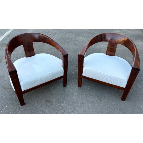 483 - IN THE MANNER OF DAVID LINLEY: TWO DEEP SEATED MID CENTURY ARMCHAIRS WITH WHITE UPHOLSTERED SEATS (2... 