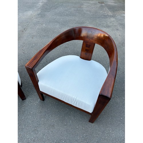 483 - IN THE MANNER OF DAVID LINLEY: TWO DEEP SEATED MID CENTURY ARMCHAIRS WITH WHITE UPHOLSTERED SEATS (2... 